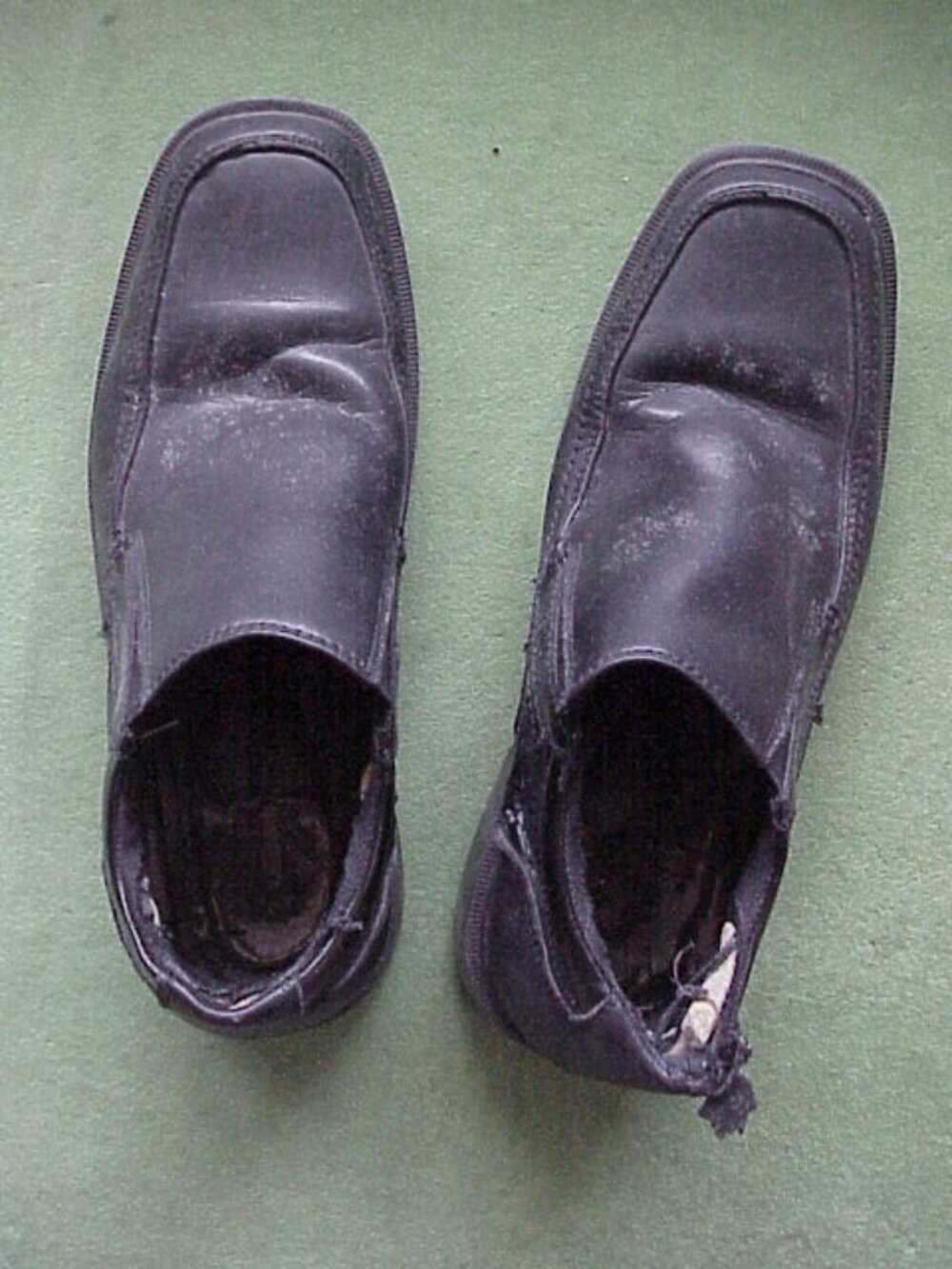 Well worn thru sole business casual Slip on Black Dockers shoes size 8.5